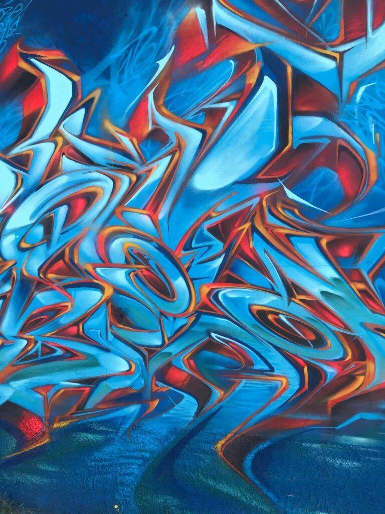 Graffiti urbano wildstyle en técnica 3D realista
