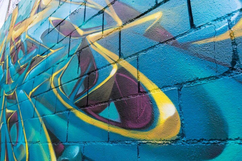 Graffiti tridimensional wildstyle con formas energéticas