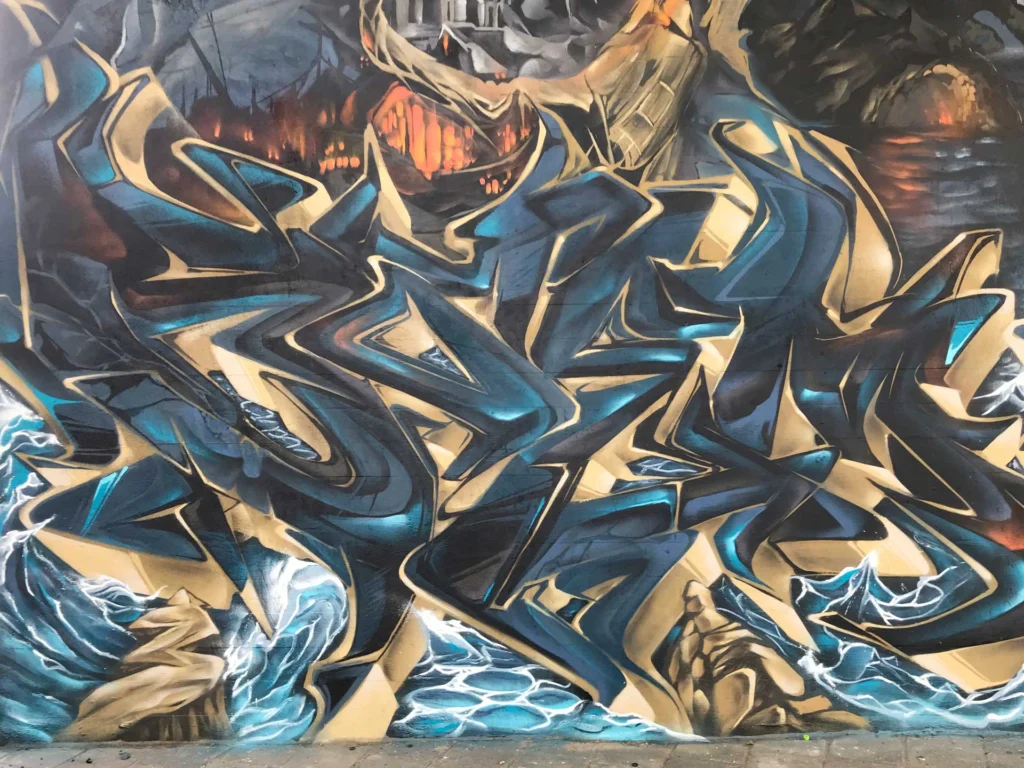 Graffiti artístico de barco y ciudad oscura en Dordrecht