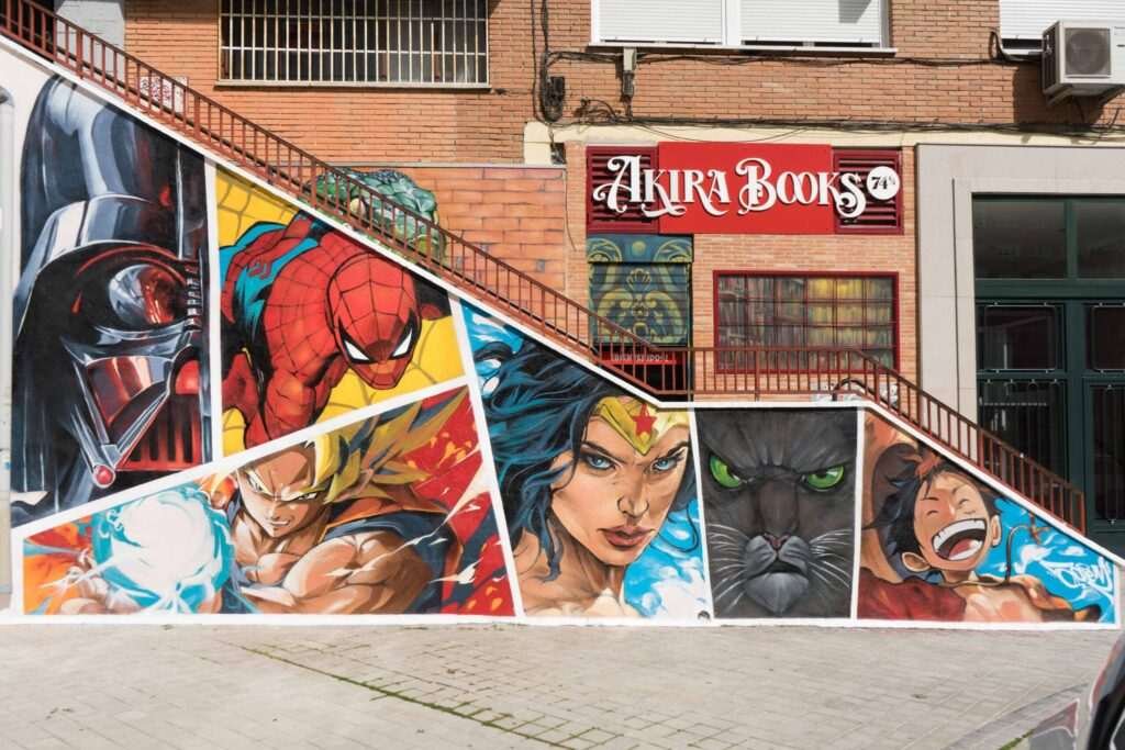 Mural en Akira Books Madrid con Spiderman, Goku, Wonder Woman, Luffy, Darth Vader y Black Panther