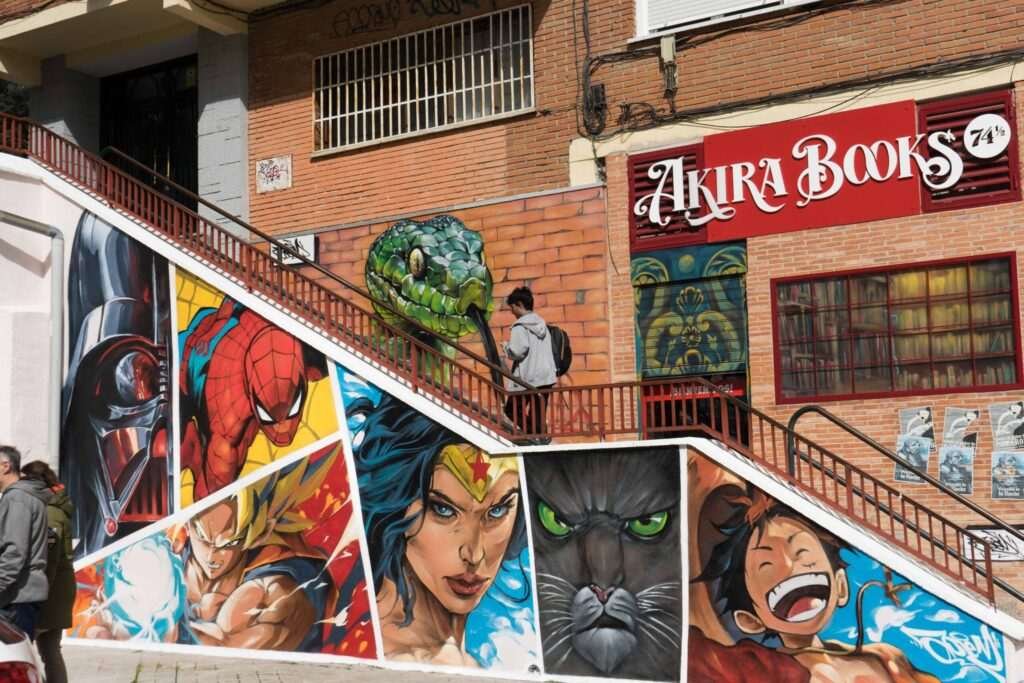Mural en Akira Books Madrid con Spiderman, Goku, Wonder Woman, Luffy, Darth Vader y Black Panther