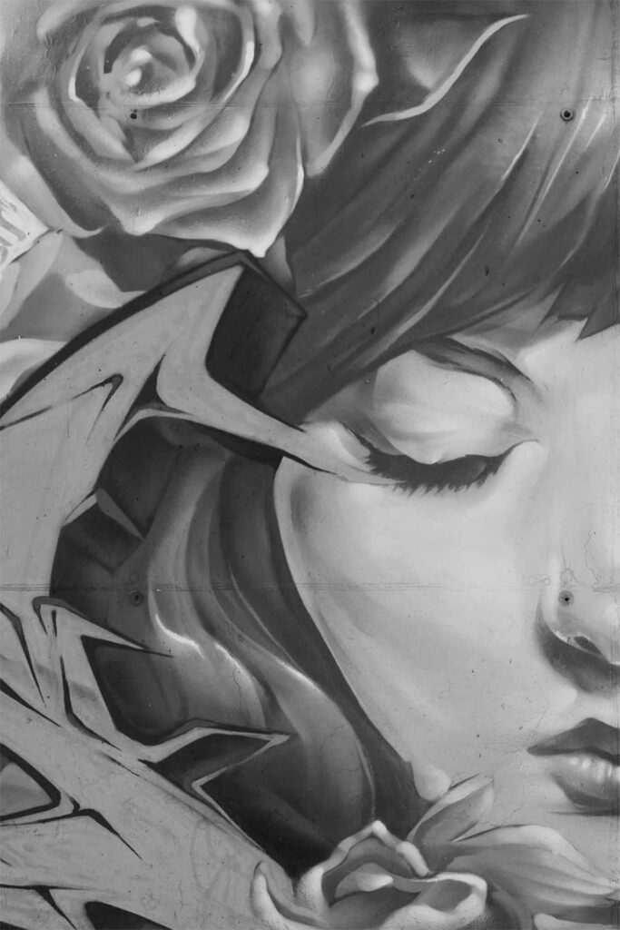 Mural de patio con barniz antigraffiti en un centro educativo de Madrid