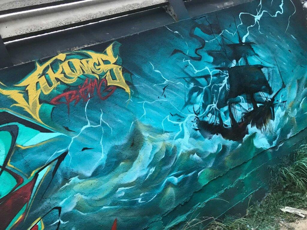 Mural realista de Lagertha y barco vikingo en tormenta
