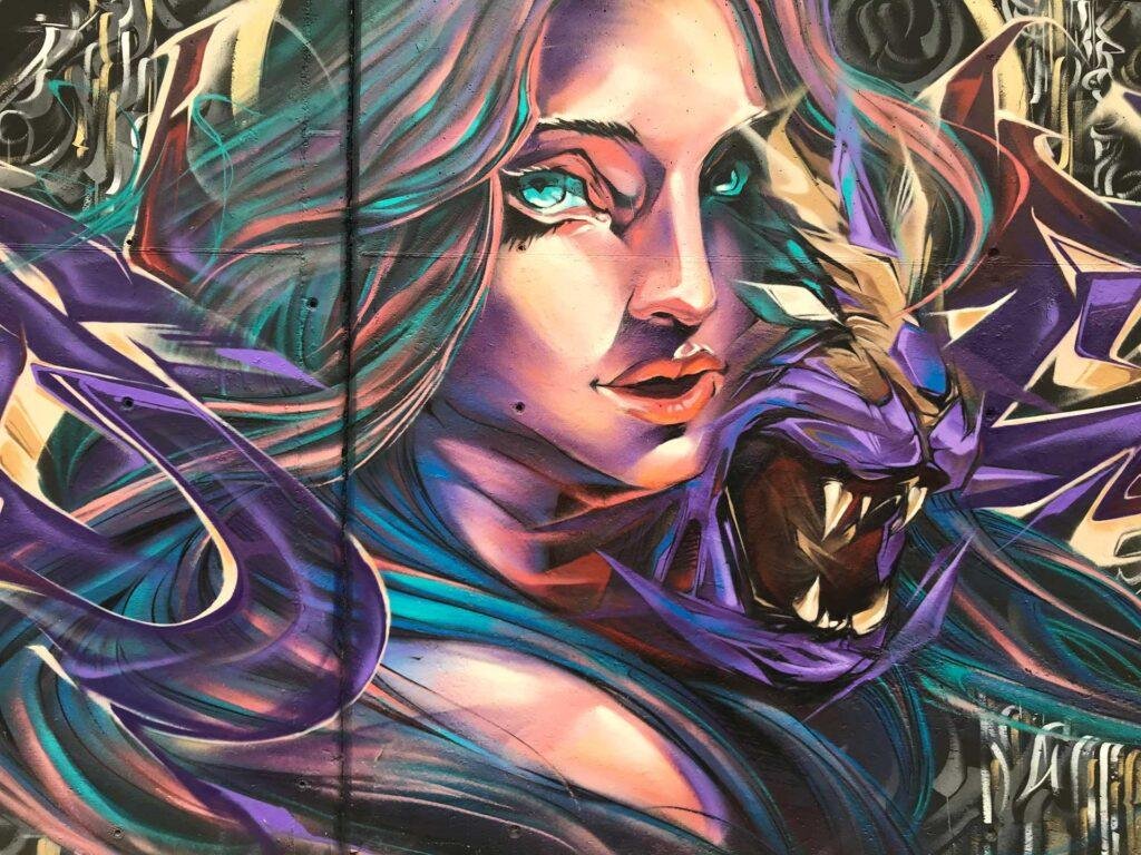 Mural Wild Beauty de gran formato en la fachada del IES Gregorio Marañón