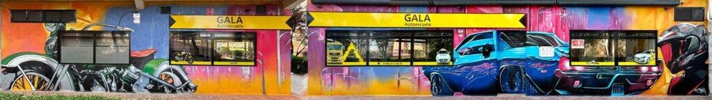Mural de moto pintado en la fachada de GALA Autoescuela Móstoles como parte del proyecto urbano