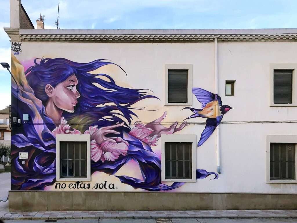 Mural monumental contra la violencia de género en Castellnou de Seana, obra de El Arte Urbano