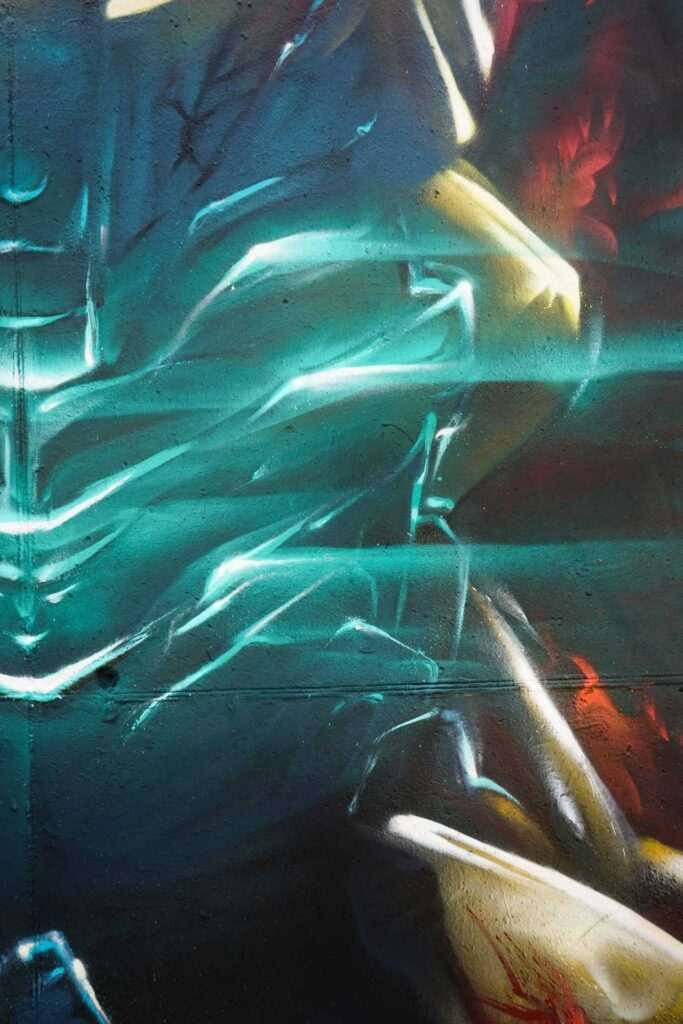 Mural de Dead Space con personaje futurista y graffiti profesional