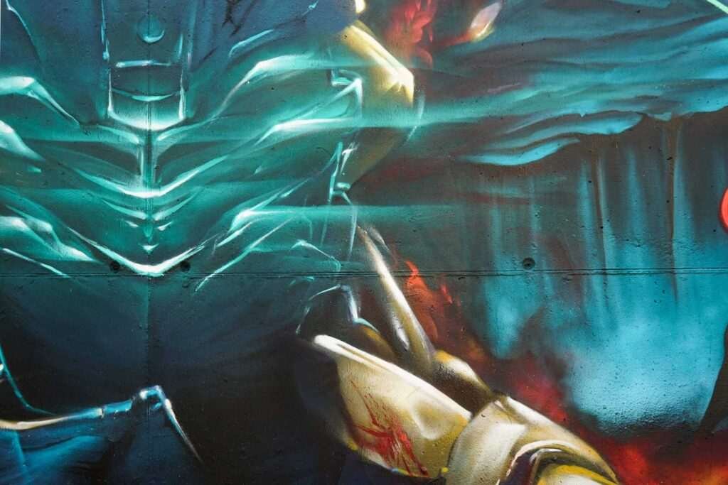 Mural de Dead Space con personaje futurista y graffiti profesional