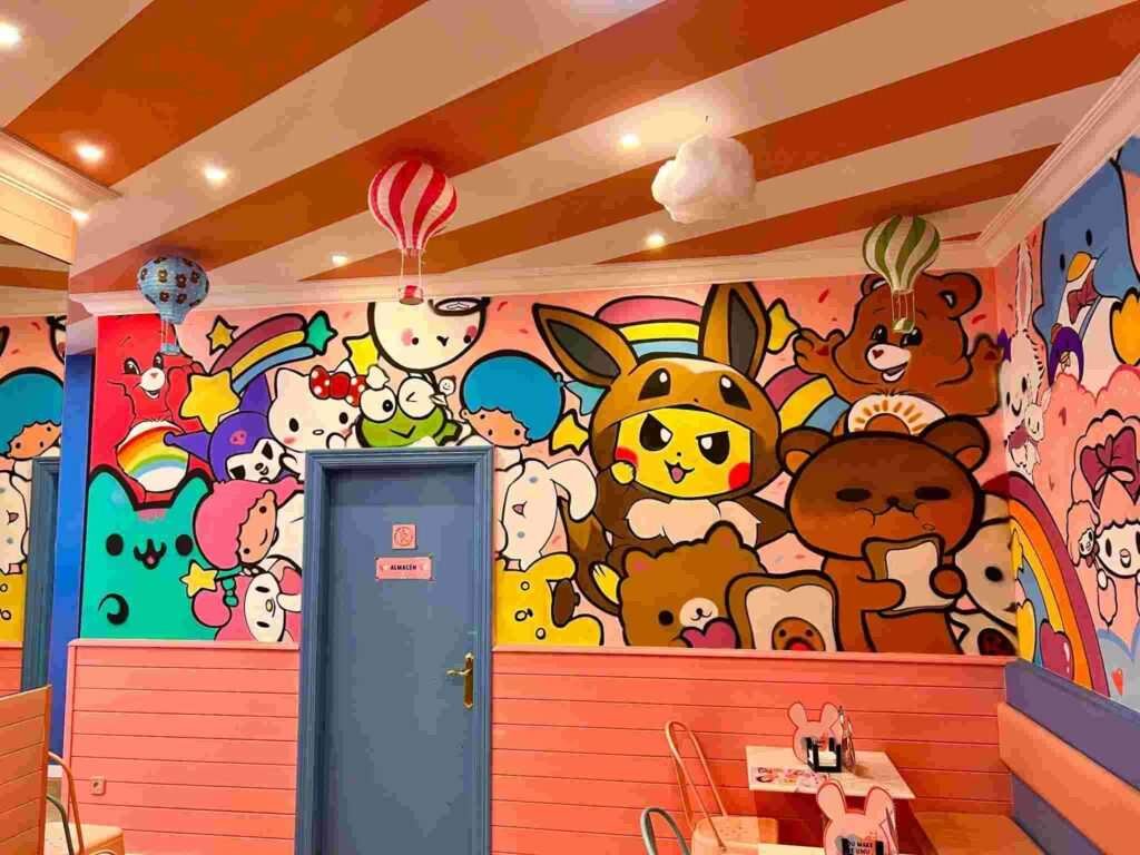 Mural kawaii en Kawaii Café Oviedo con personajes y repostería