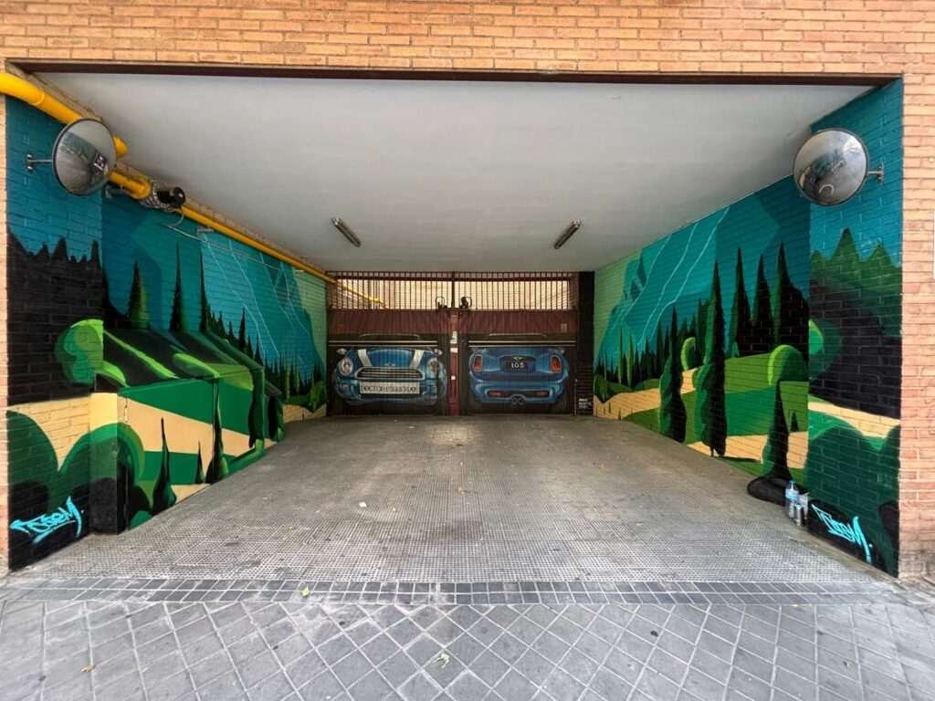 Graffiti de paisaje natural en garaje de comunidad en Madrid