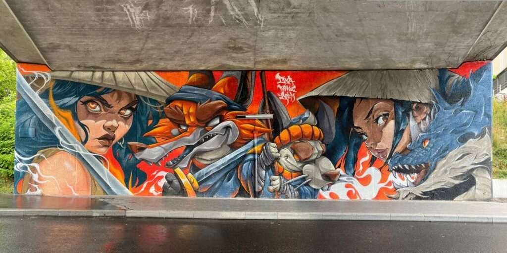 Mural urbano de samurái y dragón pintado en festival CapsAttack en París