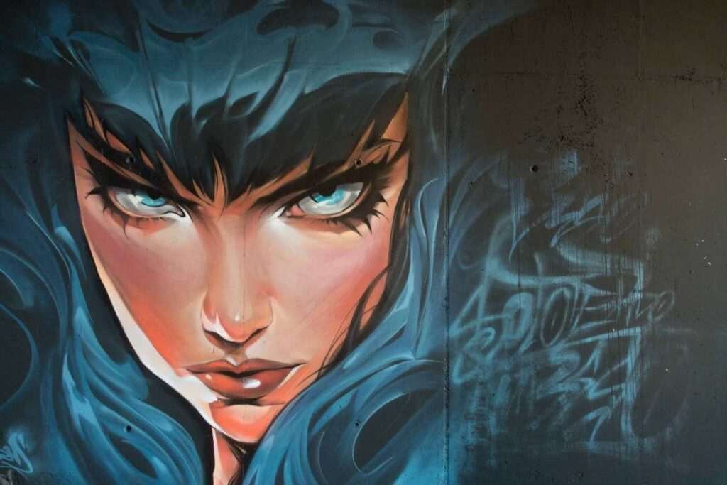 Retrato de mujer en mural de graffiti hiperrealista