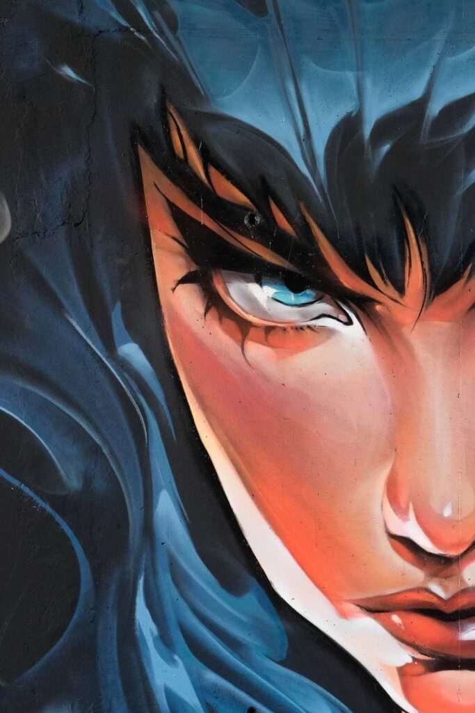 Retrato de mujer en mural de graffiti hiperrealista
