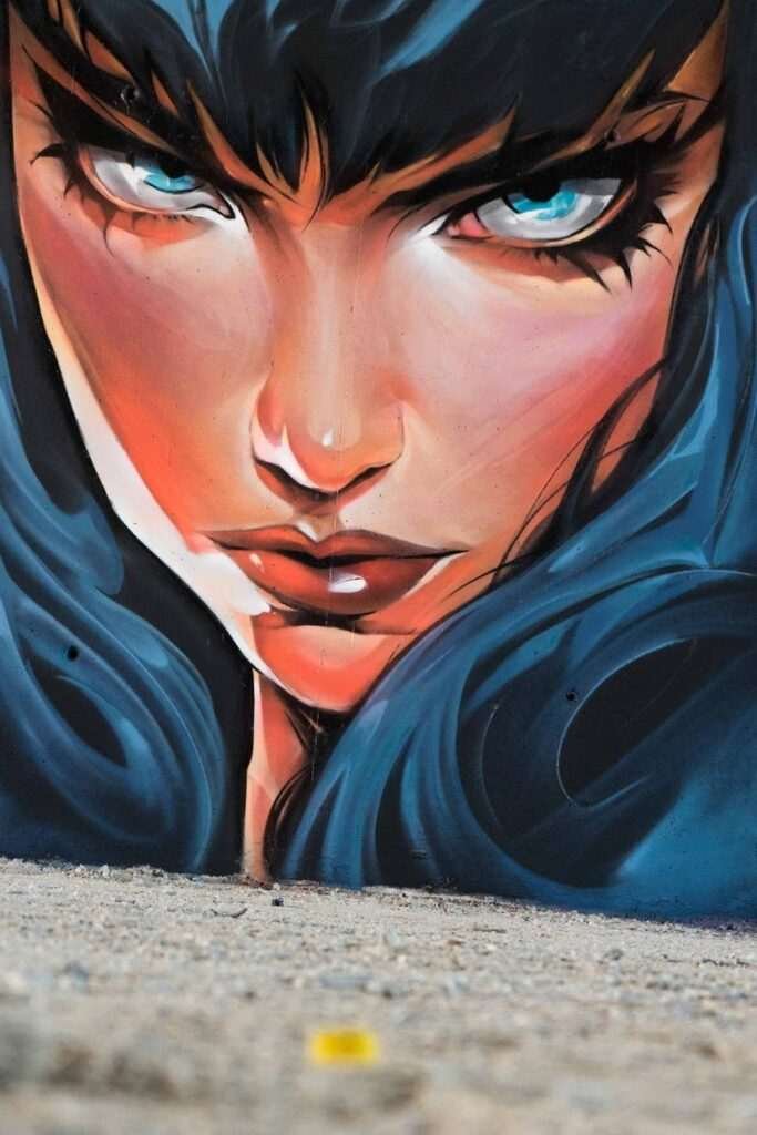 Retrato de mujer en mural de graffiti hiperrealista