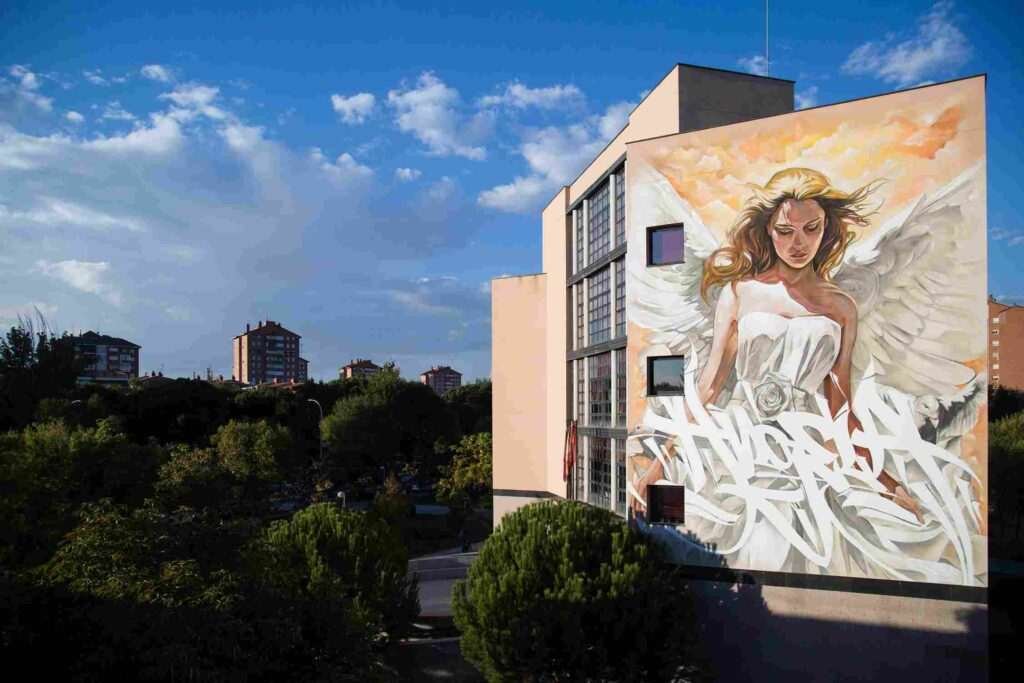 Detalle inferior mural "Ángela" · mural institucional Moratalaz Madrid · El Arte Urbano
