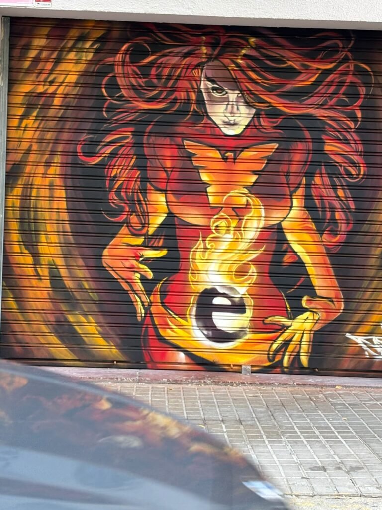 Graffiti en la persiana de Estudio Fénix, Barcelona