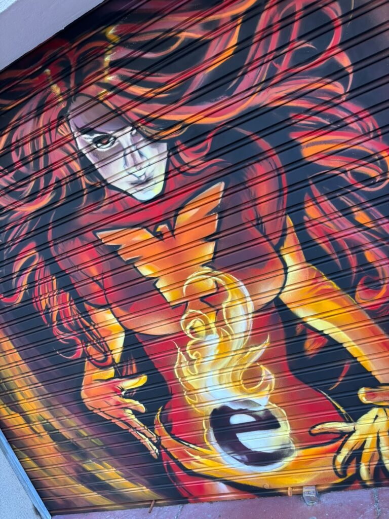 Graffiti en la persiana de Estudio Fénix, Barcelona