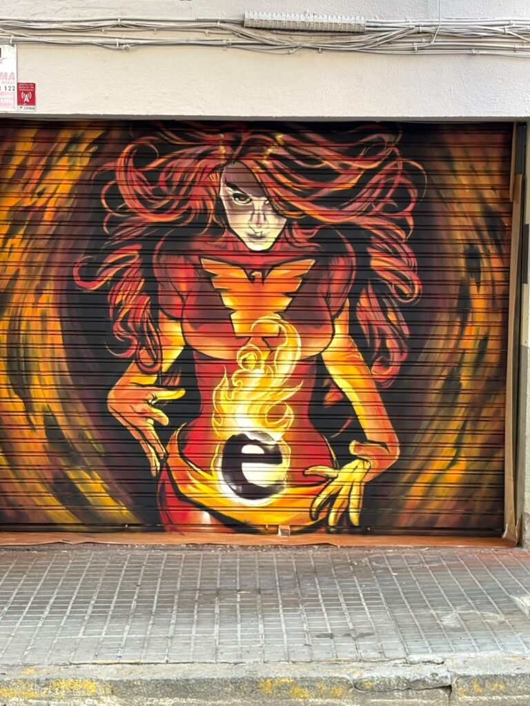 Graffiti en la persiana de Estudio Fénix, Barcelona