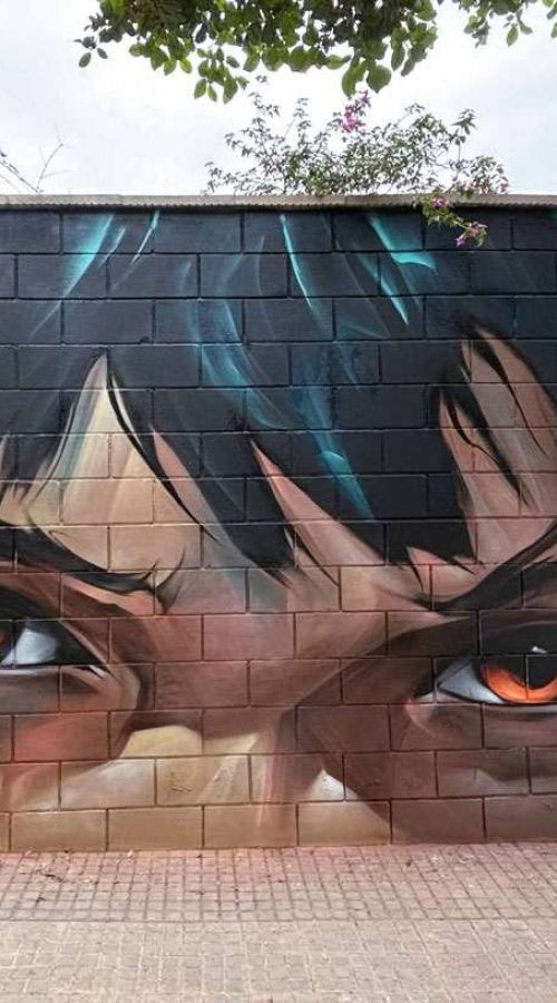 Graffiti de rostro expresivo realizado en Alaquàs por encargo del Ayuntamiento