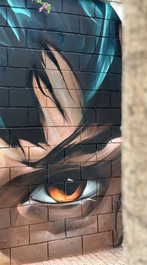 Graffiti de rostro expresivo realizado en Alaquàs por encargo del Ayuntamiento