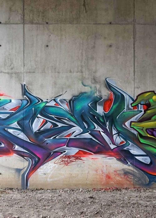 Mural graffiti 3D wildstyle con formas abstractas dinámicas