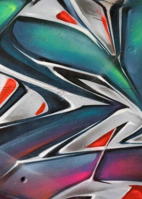 Mural graffiti 3D wildstyle con formas abstractas dinámicas