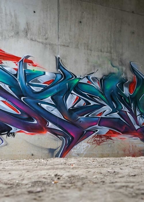 Mural graffiti 3D wildstyle con formas abstractas dinámicas