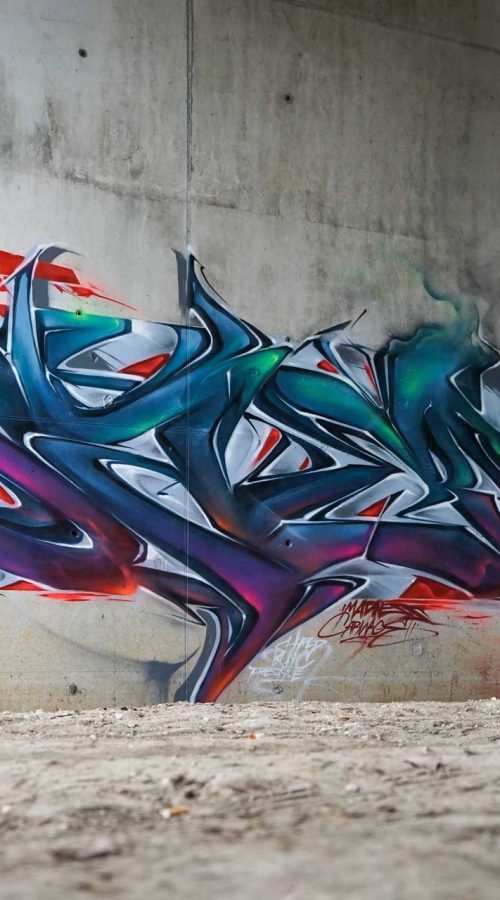 Mural graffiti 3D wildstyle con formas abstractas dinámicas