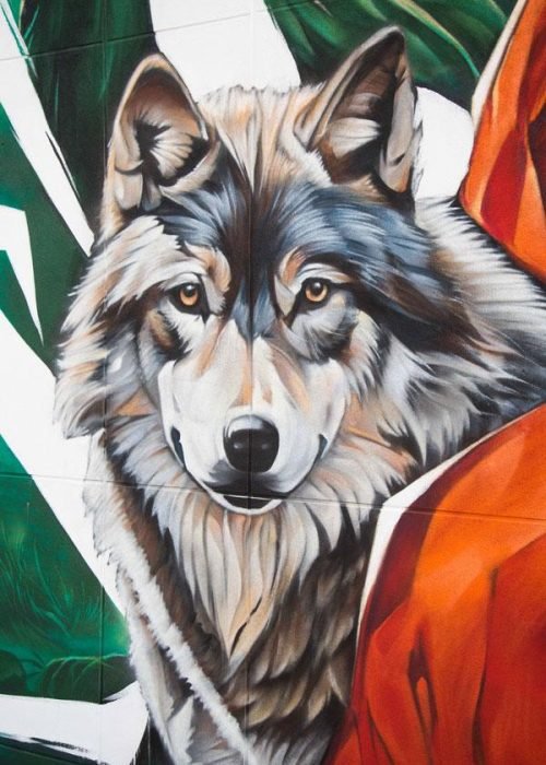 Mural de Caperucita Roja con lobos en colegio Martínez Montañés