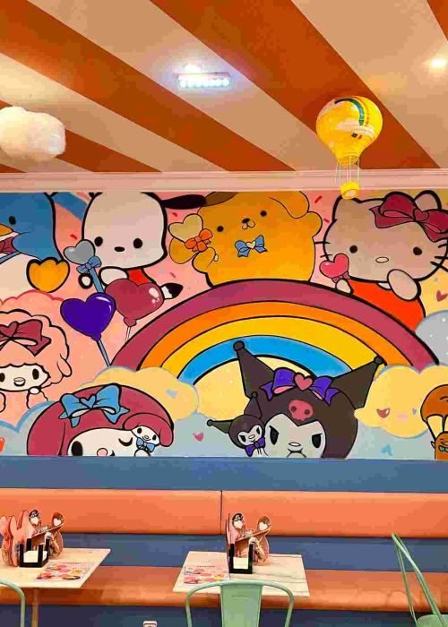 Mural kawaii en Kawaii Café Oviedo con personajes y repostería