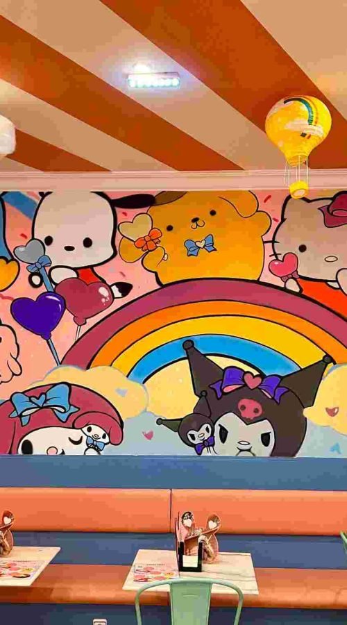 Mural kawaii en Kawaii Café Oviedo con personajes y repostería