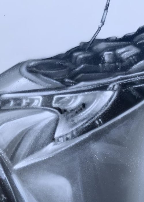 Graffiti profesional con imágenes de coches en taller Euromaster Tortosa