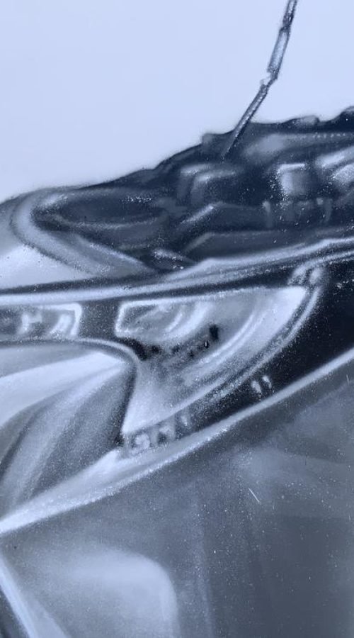 Graffiti profesional con imágenes de coches en taller Euromaster Tortosa