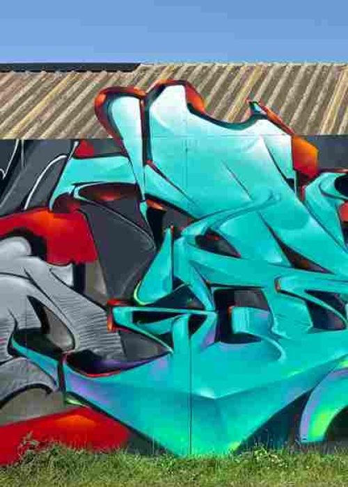 Proceso de pintura de mural 3D con líneas guía y sombreado