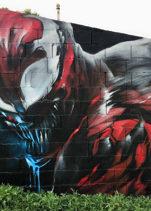 Mural urbano graffiti de Carnage, enemigo de Spiderman