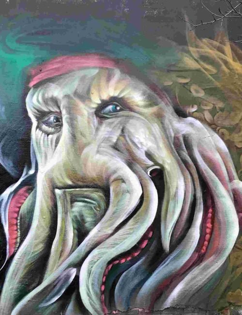 Graffiti realista de Davy Jones de Piratas del Caribe con tentáculos
