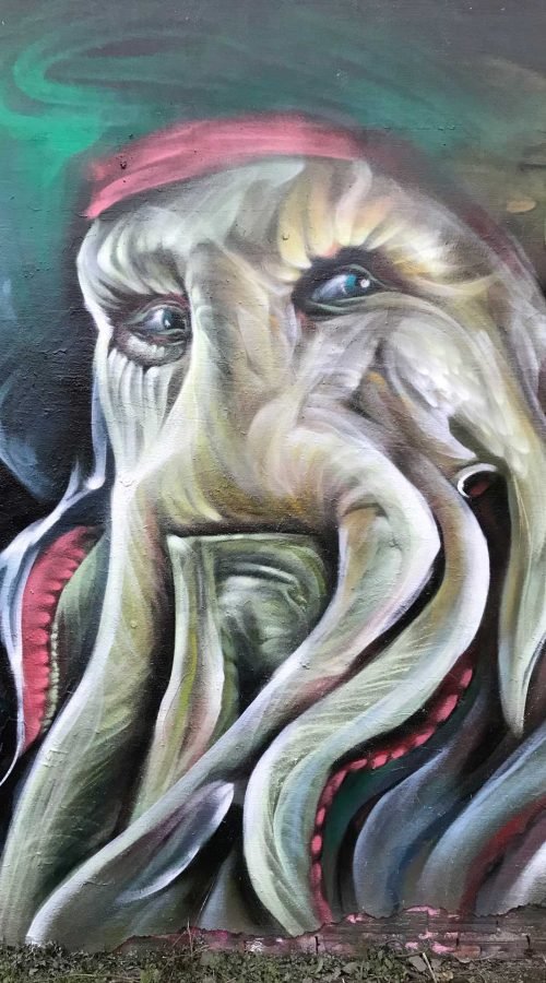 Graffiti realista de Davy Jones de Piratas del Caribe con tentáculos