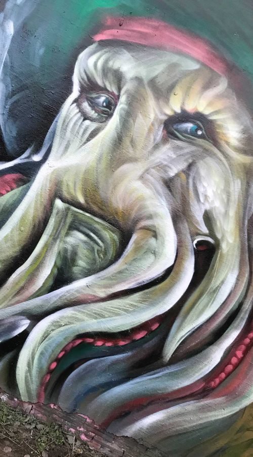 Graffiti realista de Davy Jones de Piratas del Caribe con tentáculos