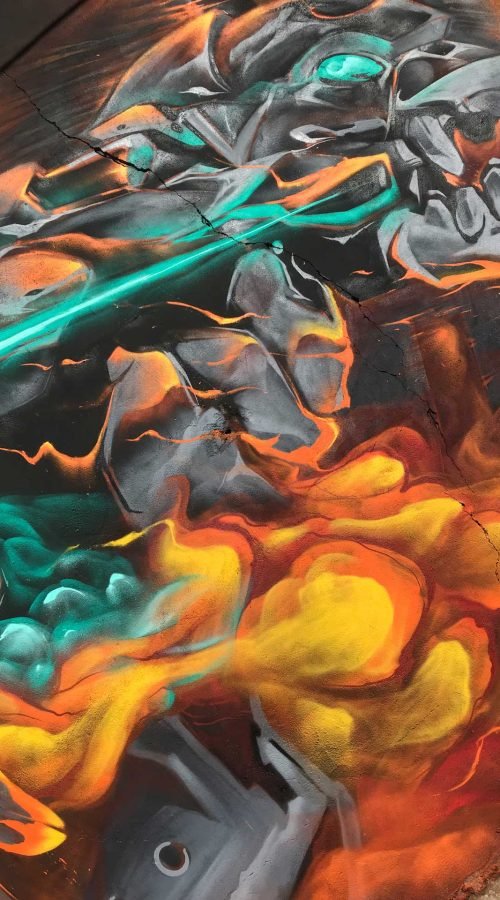 Mural graffiti Evangelion con mecha en llamas y energía