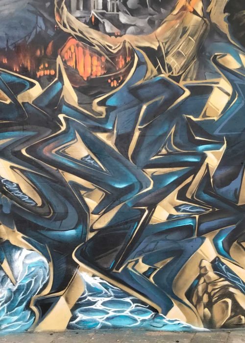 Graffiti artístico de barco y ciudad oscura en Dordrecht