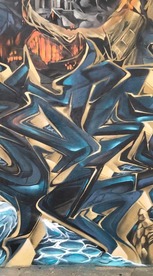 Graffiti artístico de barco y ciudad oscura en Dordrecht