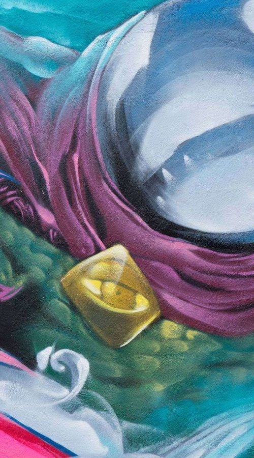 Graffiti de Misterio en mural urbano del centro comunitario Guatemala en Madrid