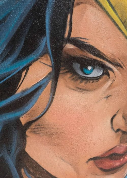 Mural en Akira Books Madrid con Spiderman, Goku, Wonder Woman, Luffy, Darth Vader y Black Panther