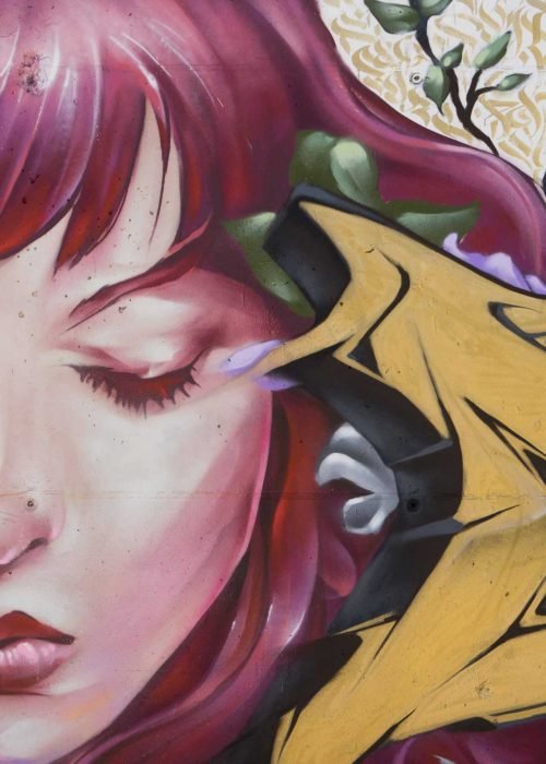 Mural graffiti Angel Cry en colegio Camilo José Cela