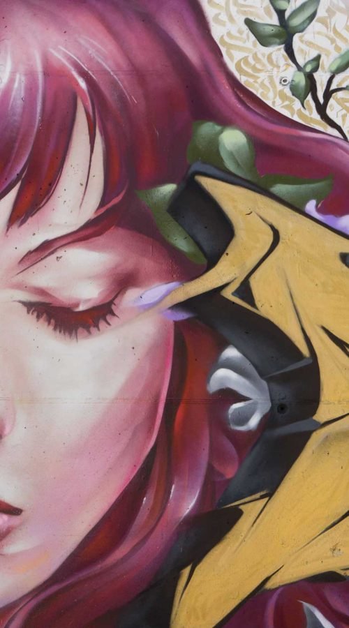 Mural graffiti Angel Cry en colegio Camilo José Cela