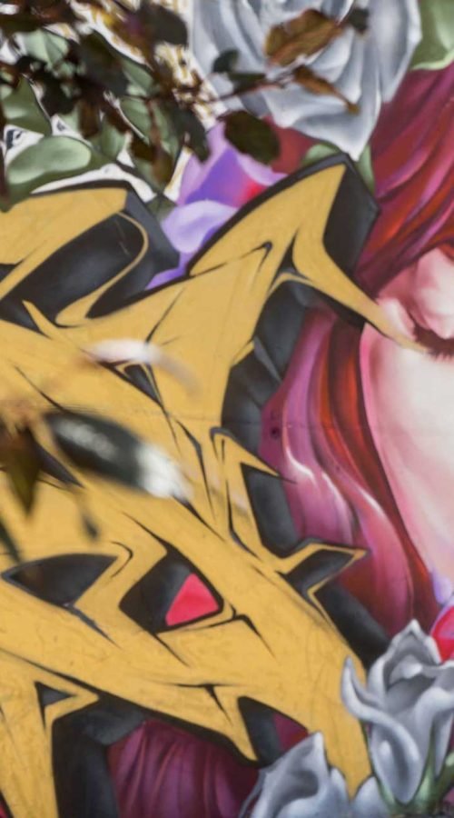 Mural graffiti Angel Cry en colegio Camilo José Cela