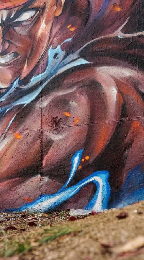 Mural con Ryu de Street Fighter en estilo graffiti para decoración interior