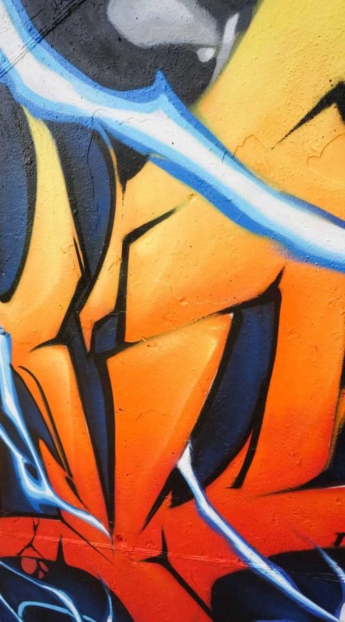 Mural con Ryu de Street Fighter en estilo graffiti para decoración interior