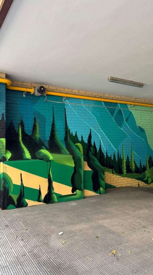 Graffiti de paisaje natural en garaje de comunidad en Madrid