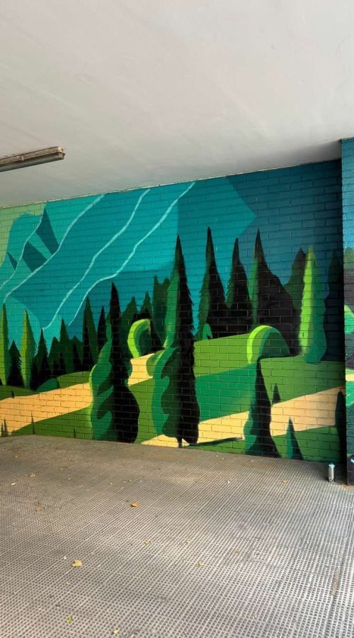 Graffiti de paisaje natural en garaje de comunidad en Madrid